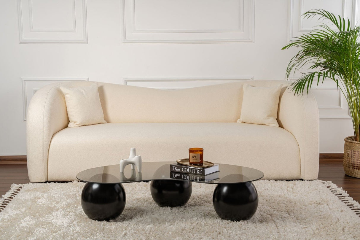 Organische salontafel grijs getint glas zwarte bolpoten Sphere 120x70 cm