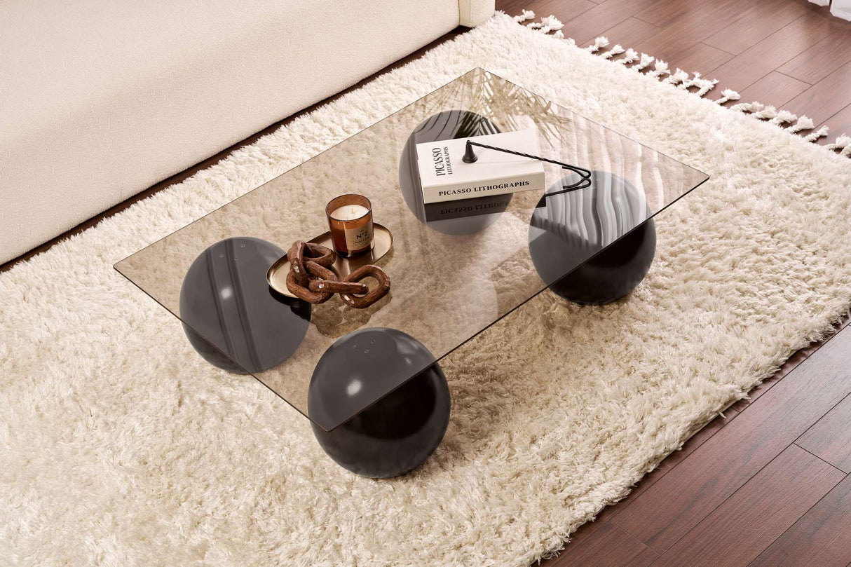 Rechthoekige salontafel brons getint glas zwarte bolpoten Sera 110x75 cm