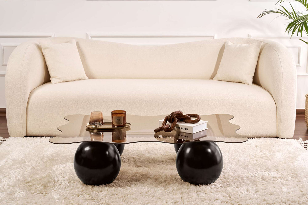 Golvende salontafel brons getint glas zwarte bolpoten Noxa 120x80 cm