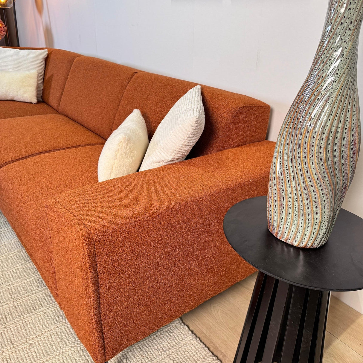 Hoekbank terracotta bouclé stof Maël - links