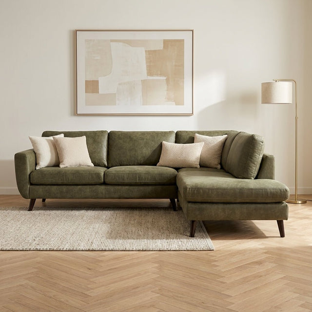 3-zits hoekbank Callum stof groen rechts sfeerfoto in modern interieur