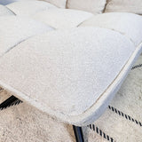 Scandinavische draaifauteuil beige bouclé stof 360° draaibaar Yuki