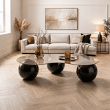 Organische salontafel brons getint glas zwarte bolpoten Sphere 120x70 cm