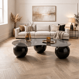 Organische salontafel grijs getint glas zwarte bolpoten Sphere 120x70 cm